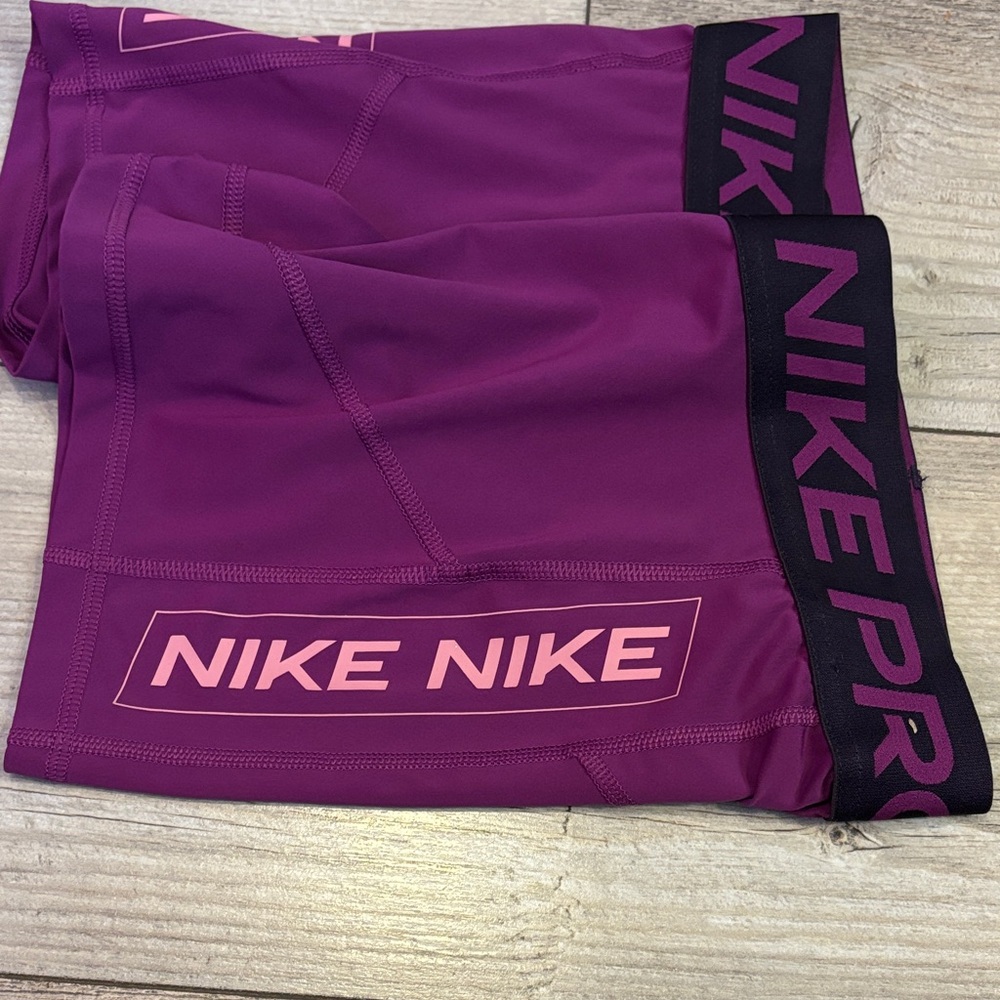 Nike Women's Magenta Athletic Shorts - Picture 3 of 5